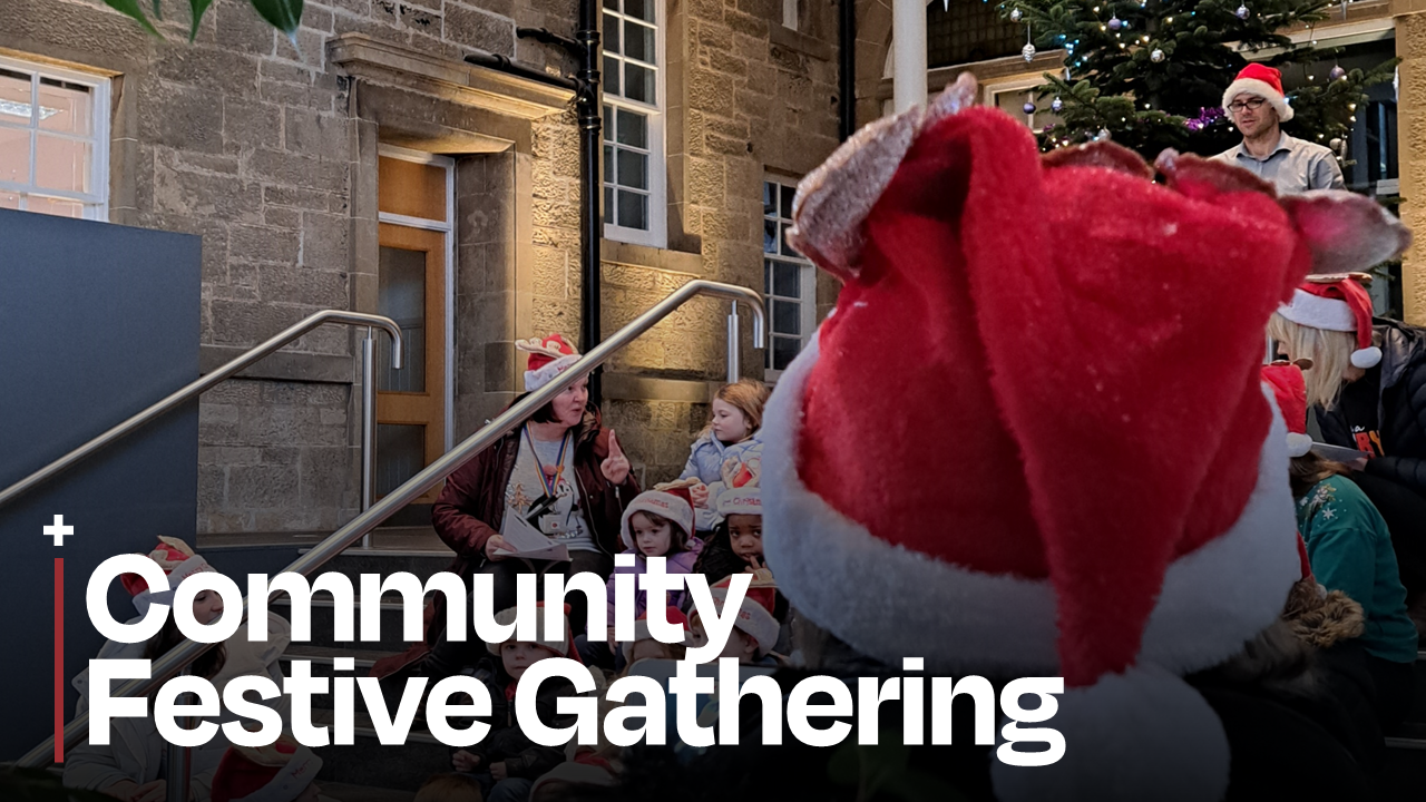 Photo of a red reindeer hat with nursey children in the background. On top is the words Community Festive Gathering