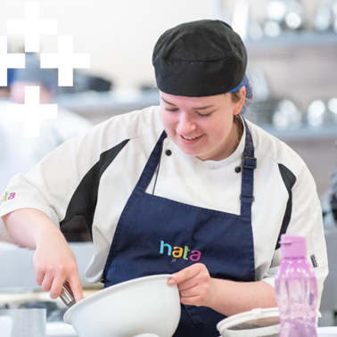 photo of hata student with a mixing bowl