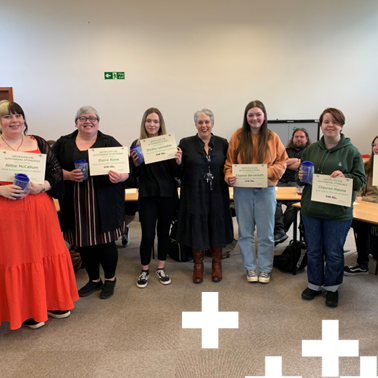 photo of social sciences students with certificate